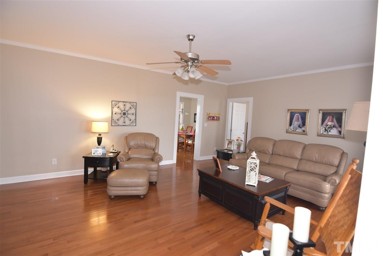 2001 Harvey Lewis Road Faison, NC 28341 - Photo 13 of 25 a living room with furniture and a wooden floor