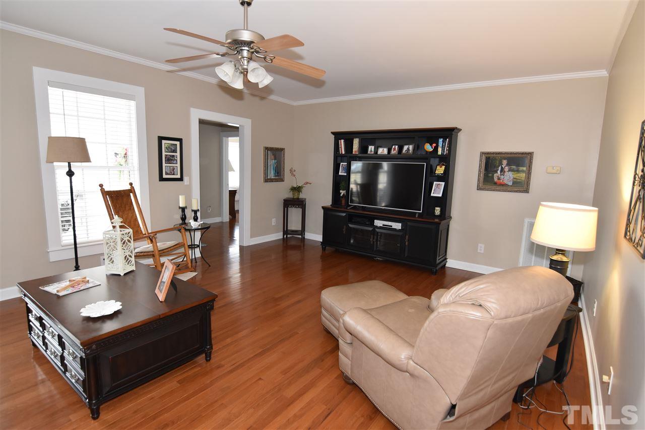 2001 Harvey Lewis Road Faison, NC 28341 - Photo 15 of 25 a living room with furniture and a flat screen tv