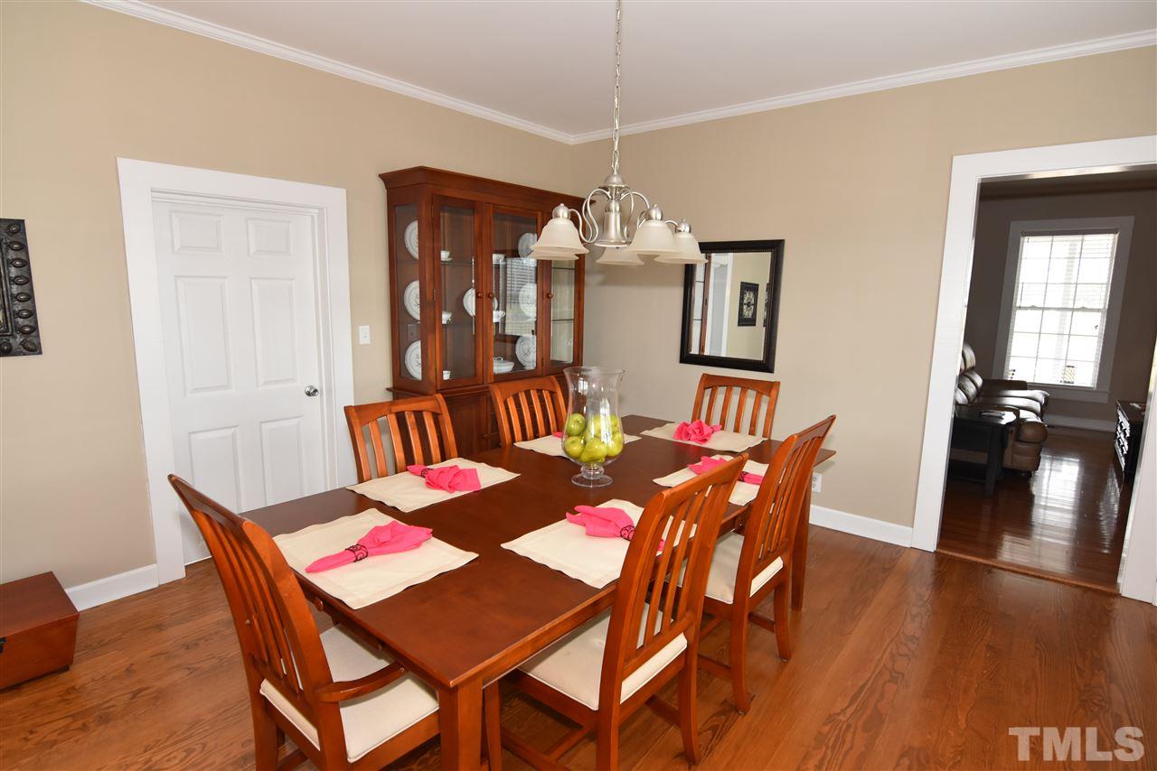 2001 Harvey Lewis Road Faison, NC 28341 - Photo 17 of 25 a view of a dining room with furniture and wooden floor