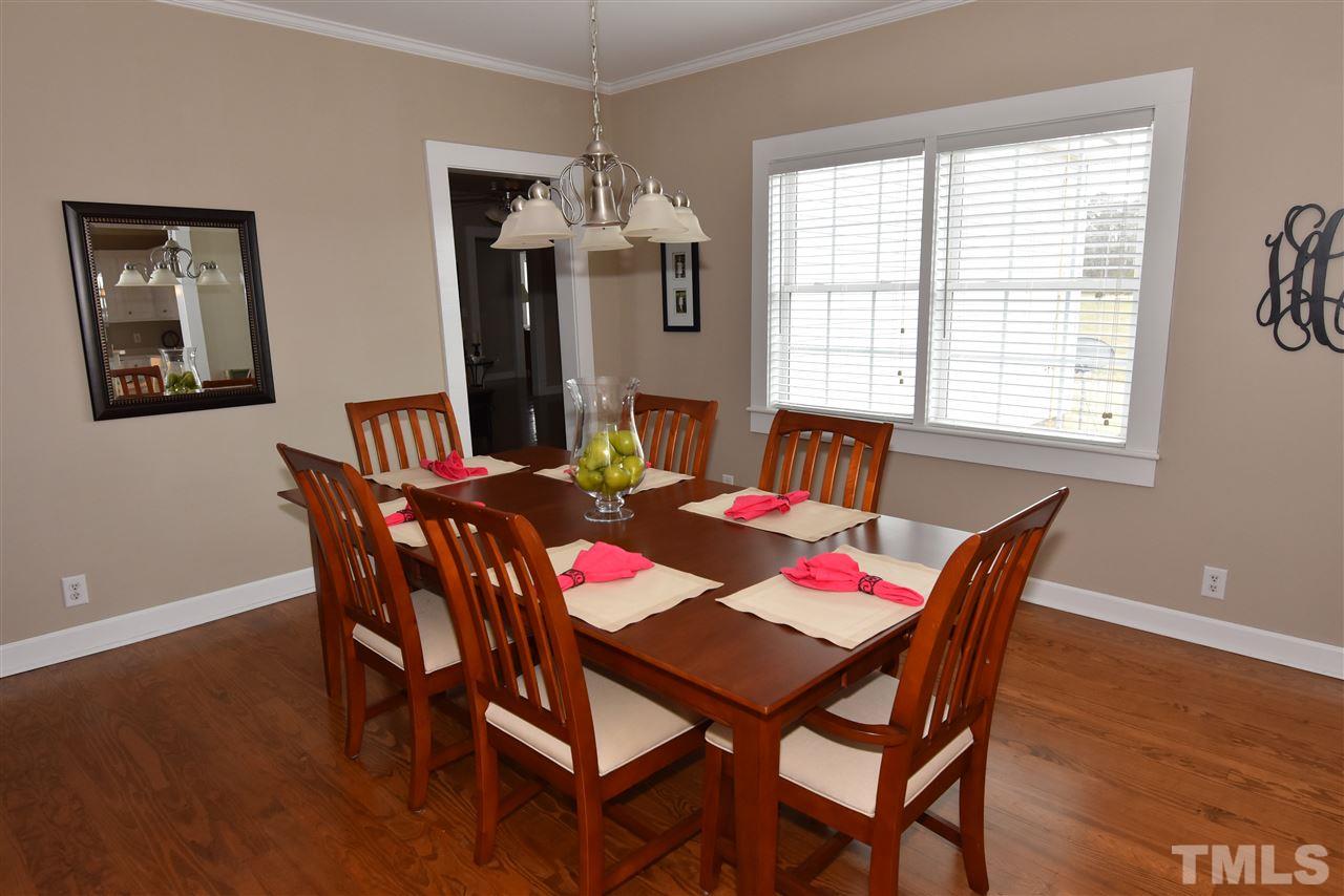 2001 Harvey Lewis Road Faison, NC 28341 - Photo 19 of 25 a view of a dining room with furniture window and wooden floor