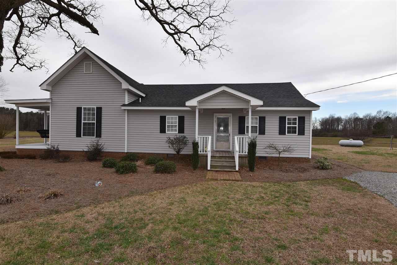 2001 Harvey Lewis Road Faison, NC 28341 - Photo 25 of 25 a view of a house with a yard and wooden fence