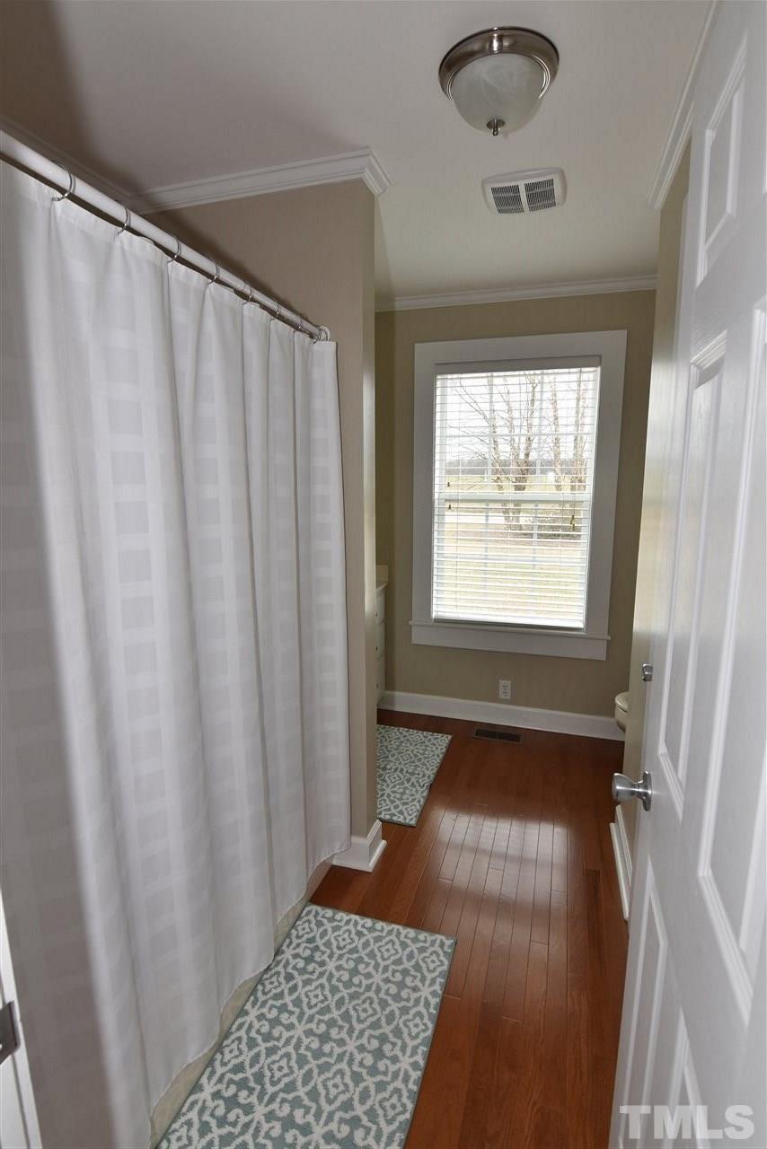 2001 Harvey Lewis Road Faison, NC 28341 - Photo 6 of 25 a view of an empty room with a window