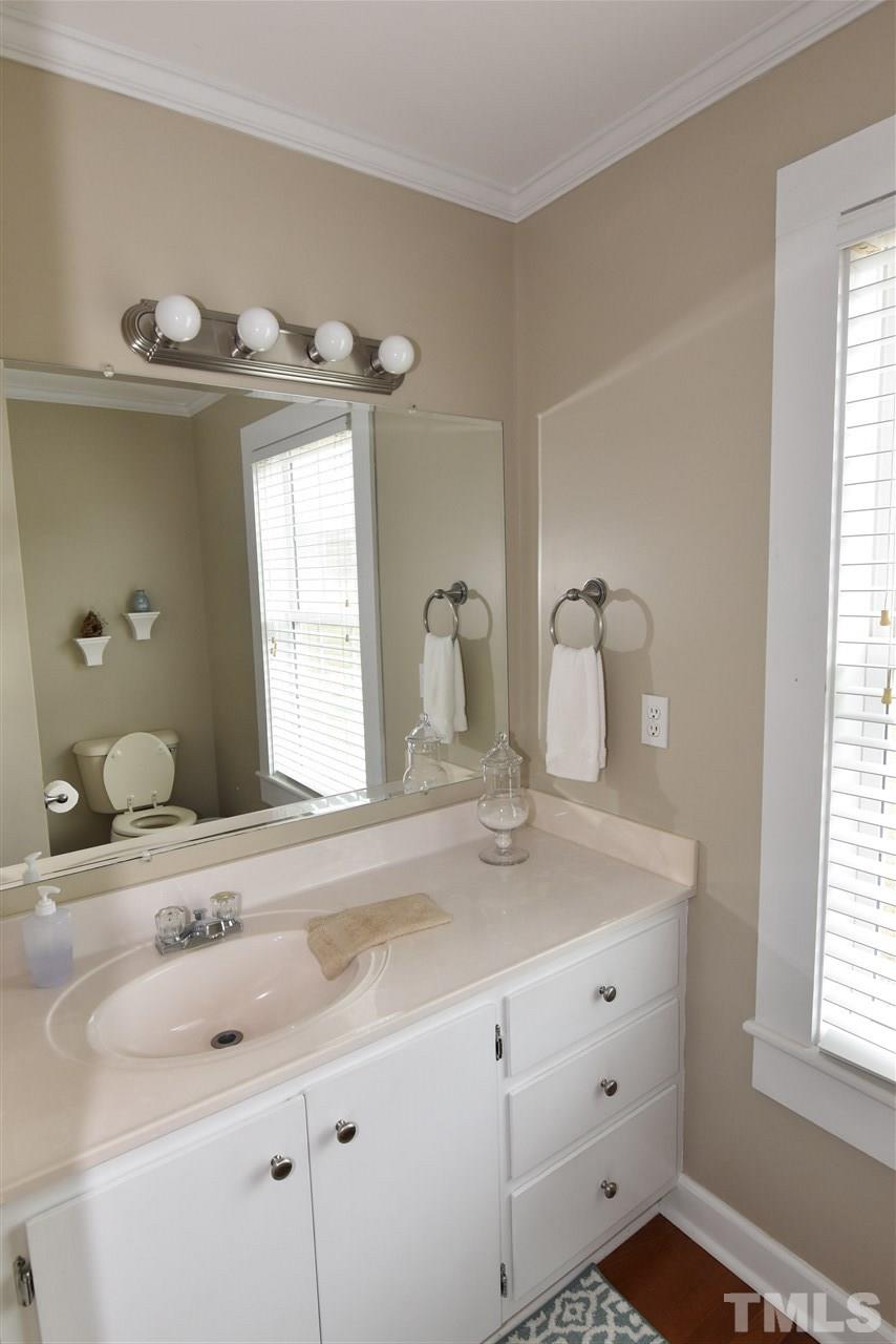 2001 Harvey Lewis Road Faison, NC 28341 - Photo 7 of 25 a bathroom with a sink and a mirror
