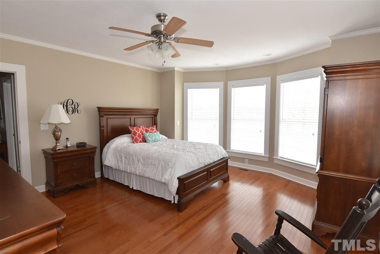 2001 Harvey Lewis Road Faison, NC 28341 - Photo 8 of 25 a bedroom with a bed and window