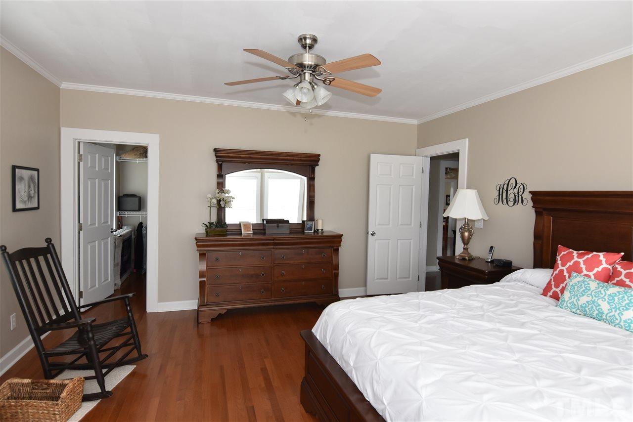 2001 Harvey Lewis Road Faison, NC 28341 - Photo 10 of 25 a bedroom with a bed and a dresser