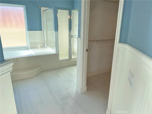 a bathroom with a toilet and a sink