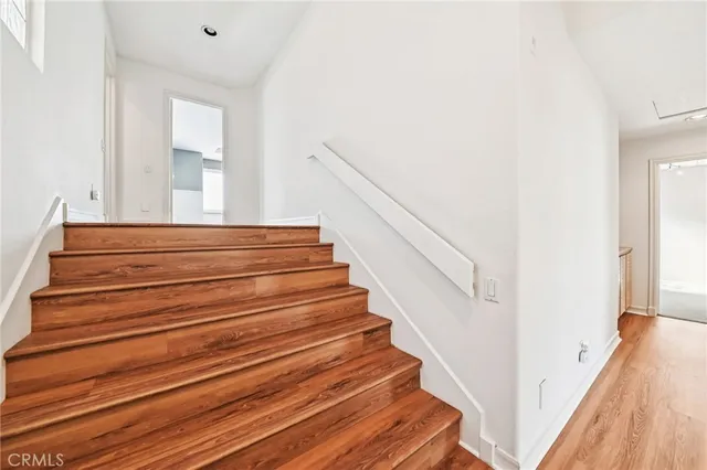 a bathroom with a double vanity sink toilet and shower