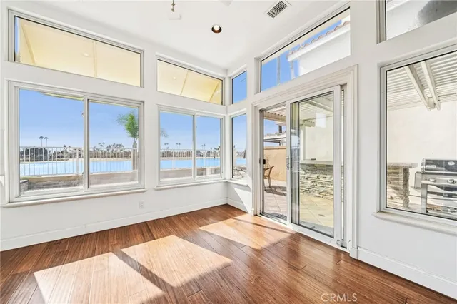 a view of a room that has a large window