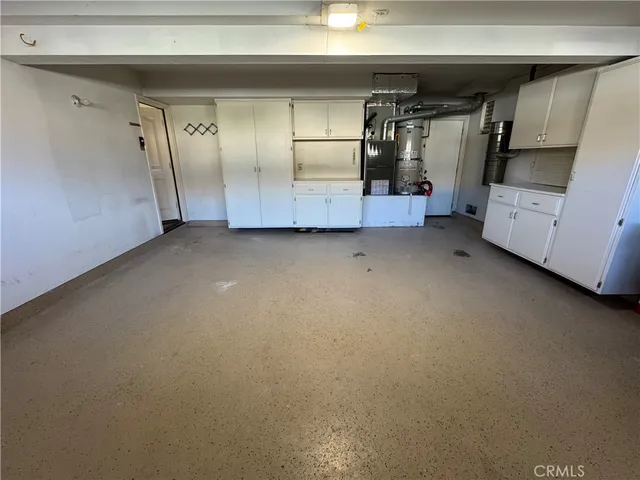 an aerial view of residential building and parking space