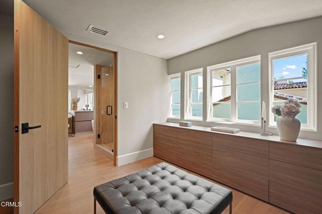 a view of a chairs and table on the wooden floor