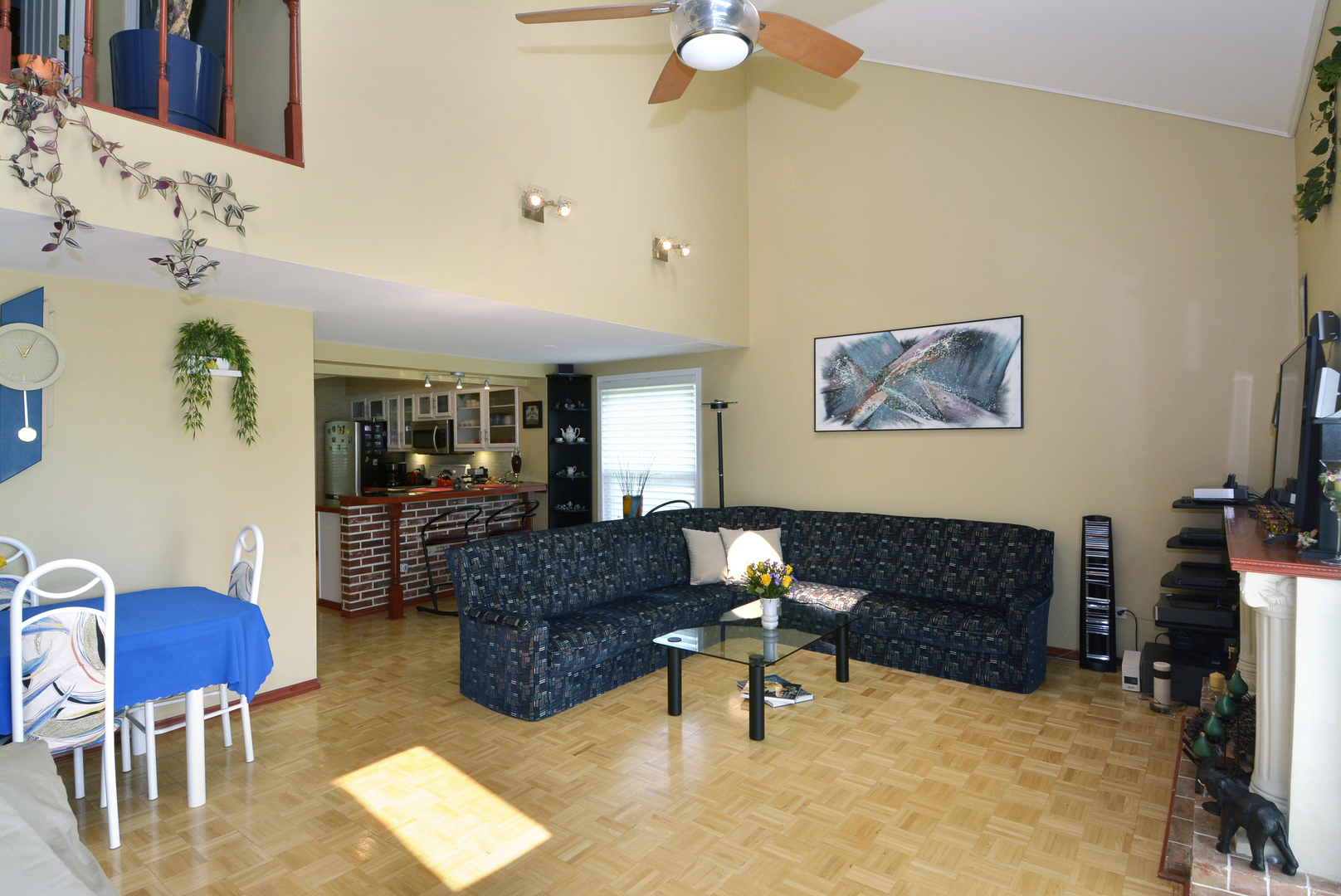 173 North Oltendorf Road Streamwood, IL 60107 - Photo 8 of 22 a living room with furniture and a dining area with kitchen countertops