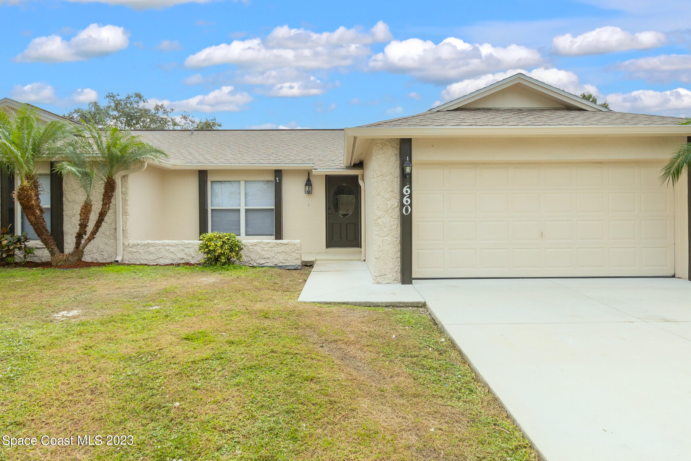 660 Crowberry Road Northeast Palm Bay, FL 32907 - Photo 3 of 48 Front of the house