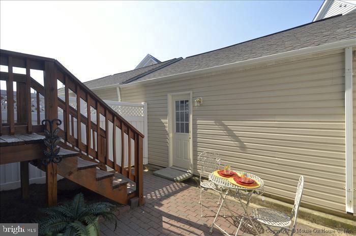 52 Golden Ash Way Gaithersburg, MD 20878 - Photo 13 of 31 a backyard of a house with wooden fence