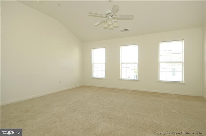 52 Golden Ash Way Gaithersburg, MD 20878 - Photo 7 of 31 an empty room with a window