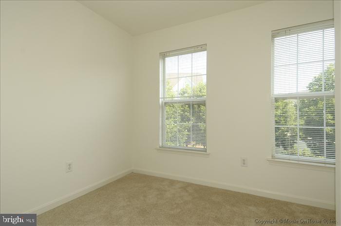 52 Golden Ash Way Gaithersburg, MD 20878 - Photo 9 of 31 an empty room with a window