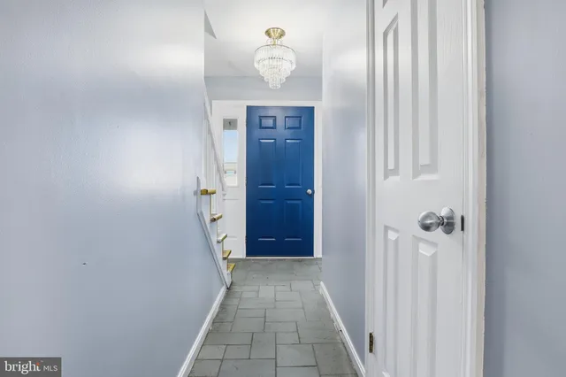 a bathroom with a sink a mirror and a shower