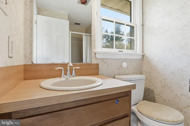 a view of an empty room with cabinet