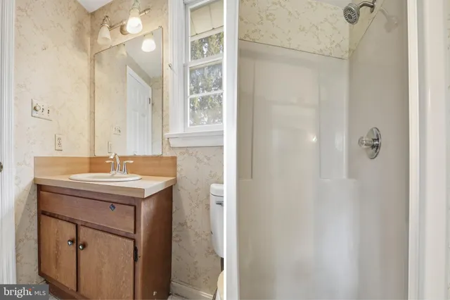 a view of room with racks on the wall