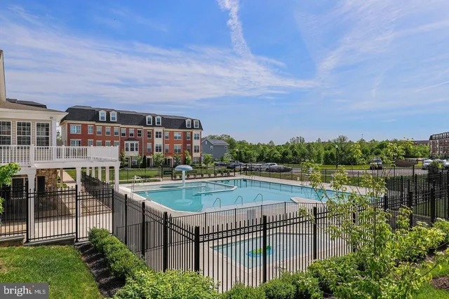 a view of a lake with a building in the background