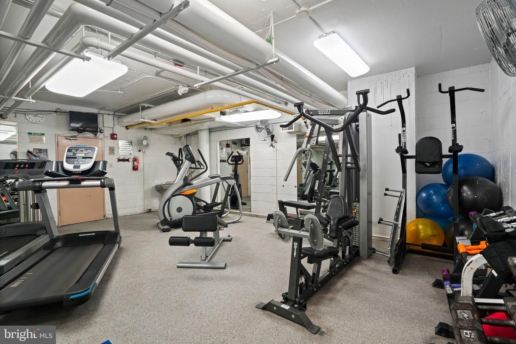 1245 4th Street Southwest, Unit E711 Washington, DC 20024 - Photo 24 of 33 a view of a room with gym equipment