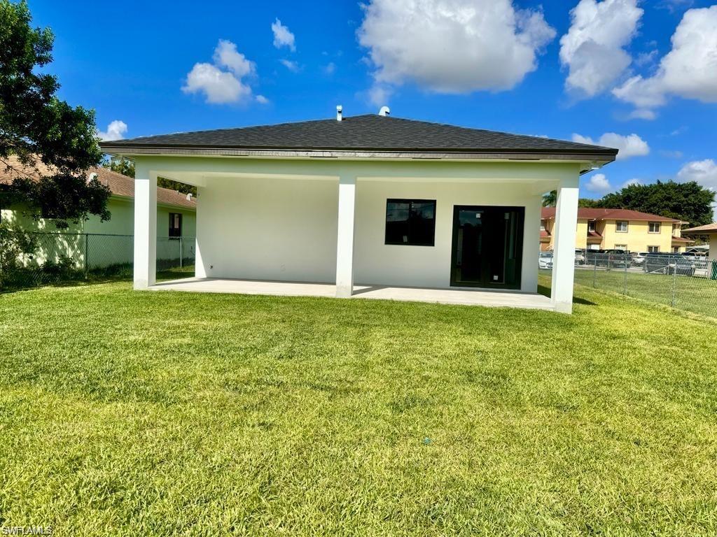 871 Southwest 2nd Street Homestead, FL 33034 - Photo 11 of 12 a view of a house with a yard