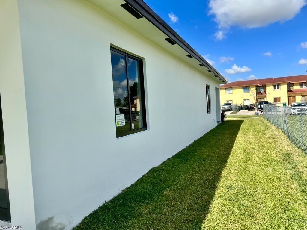 871 Southwest 2nd Street Homestead, FL 33034 - Photo 12 of 12 a view of a backyard with a garden