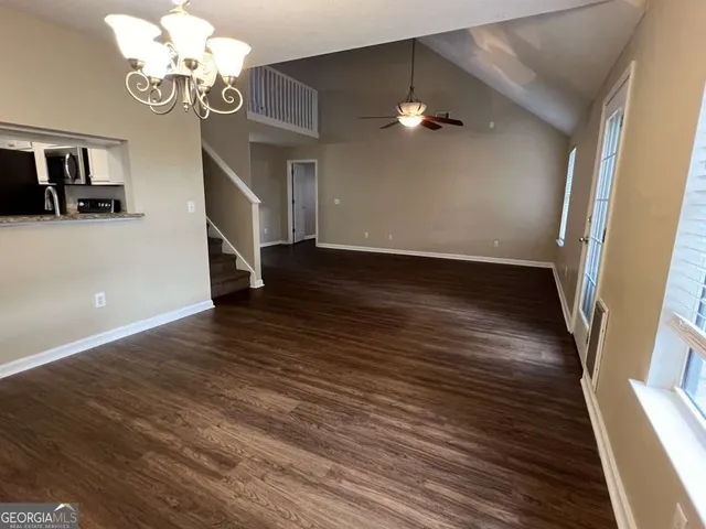 a view of a livingroom with wooden floor