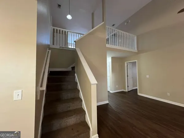 a view of entryway with wooden floor