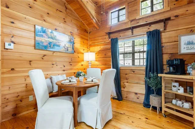 a bathroom with a double vanity sink toilet and shower
