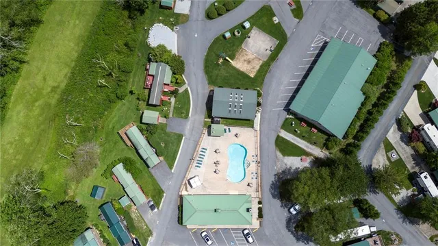 a view of a swimming pool with a patio