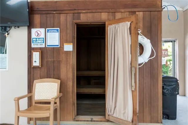 an aerial view of a golf course with parking space