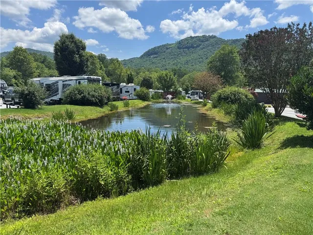 a view of living room kitchen and dining room