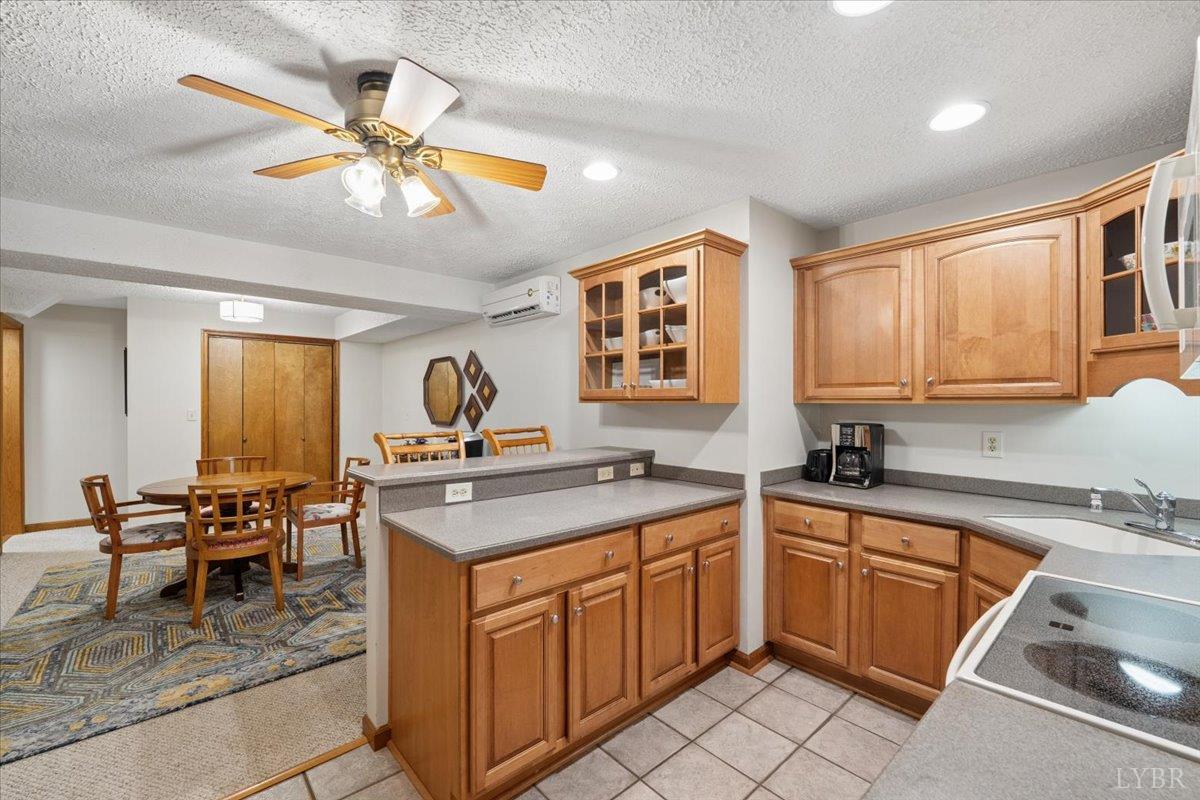 3289 Peaks Road Bedford, VA 24523 - Photo 56 of 71 a kitchen with a sink appliances and cabinets