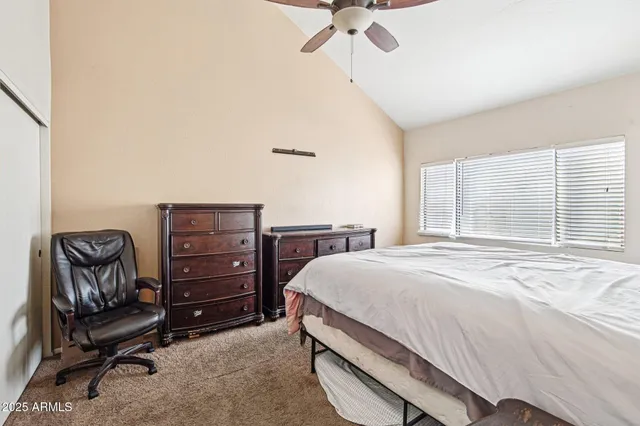 a kitchen with cabinets and steel stainless steel appliances