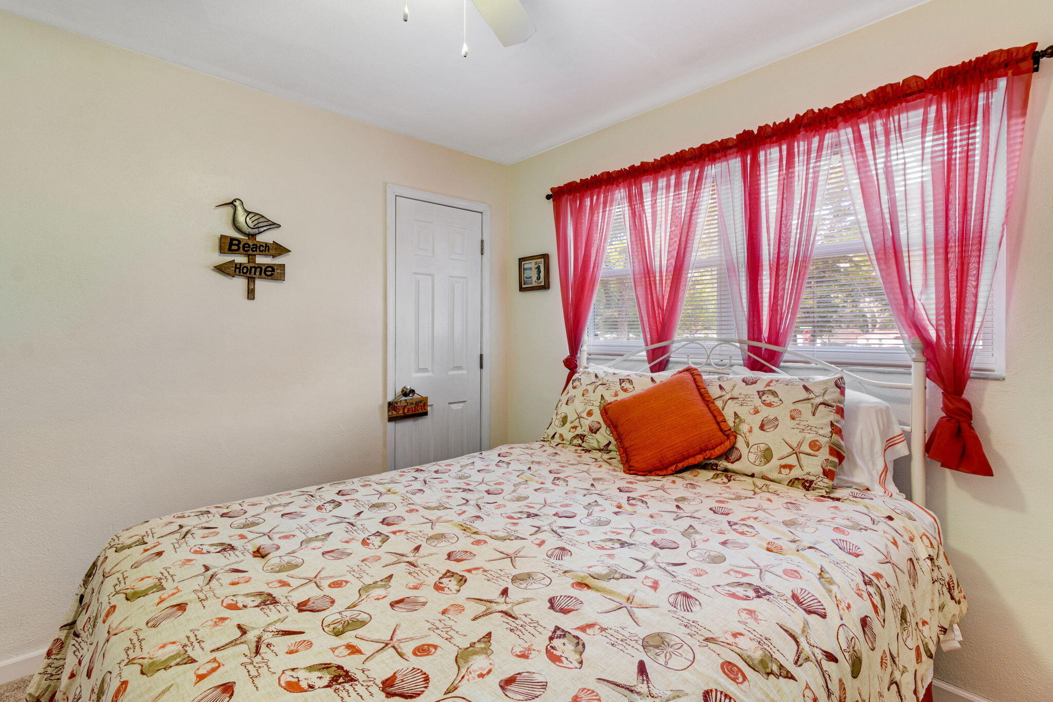 103 Adkinson Drive Crestview, FL 32536 - Photo 16 of 19 a bedroom with a bed and window