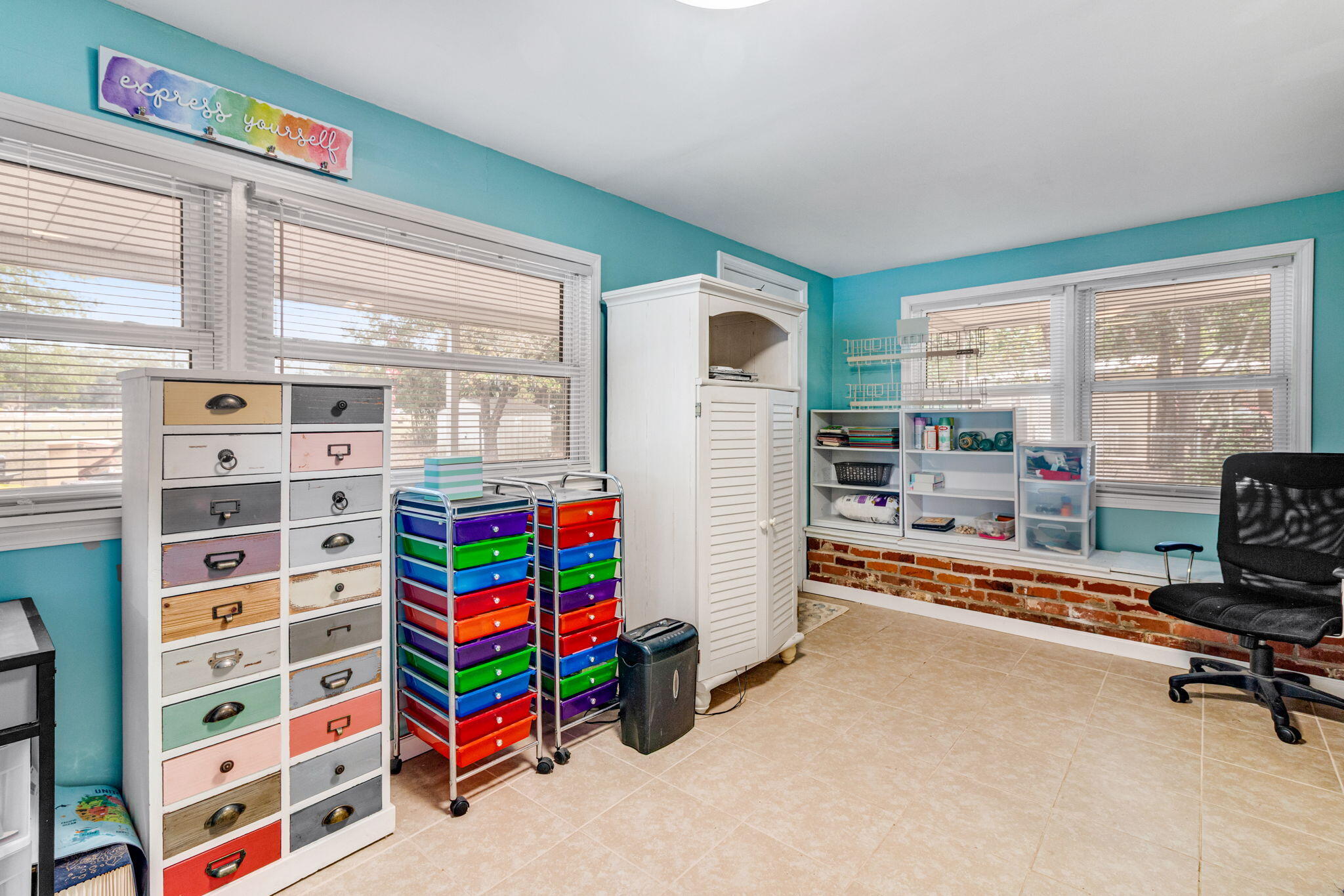 103 Adkinson Drive Crestview, FL 32536 - Photo 5 of 19 a room with furniture and a large window