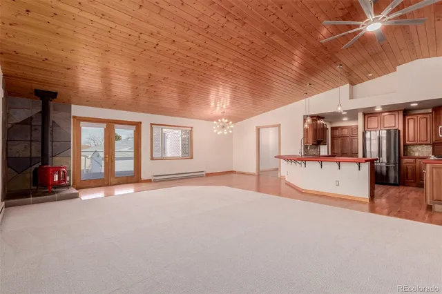 a view of a water heater room with a lot of windows