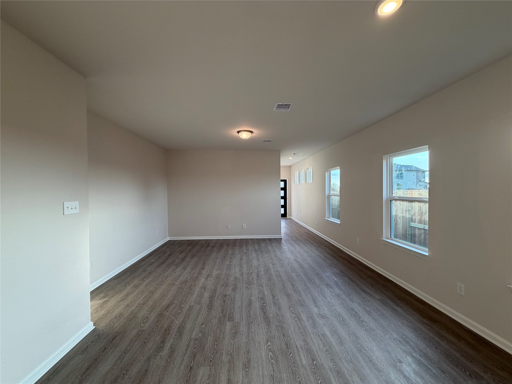 429 Stone Placa Trail Pattison, TX 77423 - Photo 8 of 17 The Mockingbird II- Family Room into Breakfast Area into Foyer