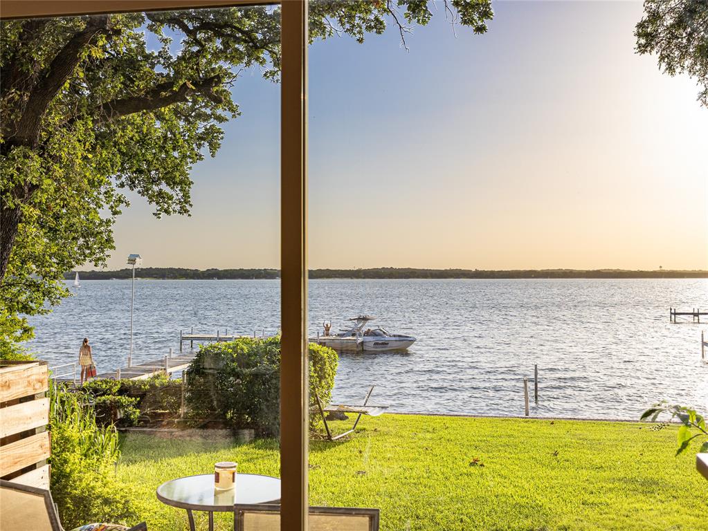 9999 Boat Club Road, Unit 601 Fort Worth, TX 76179 - Photo 27 of 39 Wide-open water views stretch across the horizon, visible from throughout the community.
