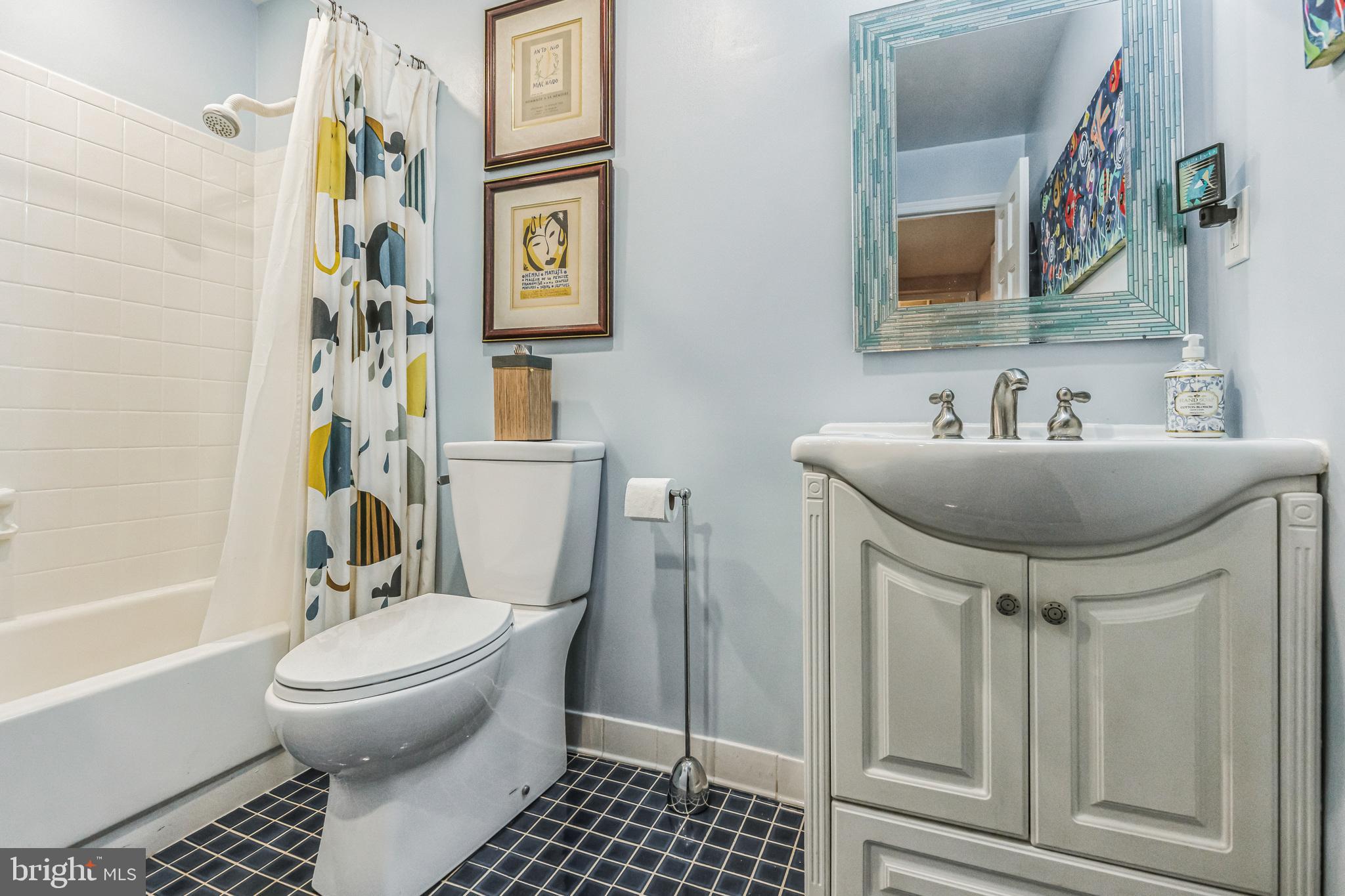 1325 13th Street Northwest, Unit 1 Washington, DC 20005 - Photo 29 of 43 Second full bathroom with tile flooring