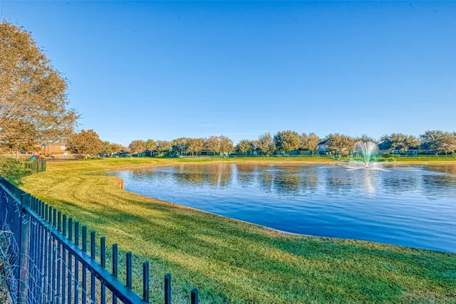 a view of a lake with a big yard