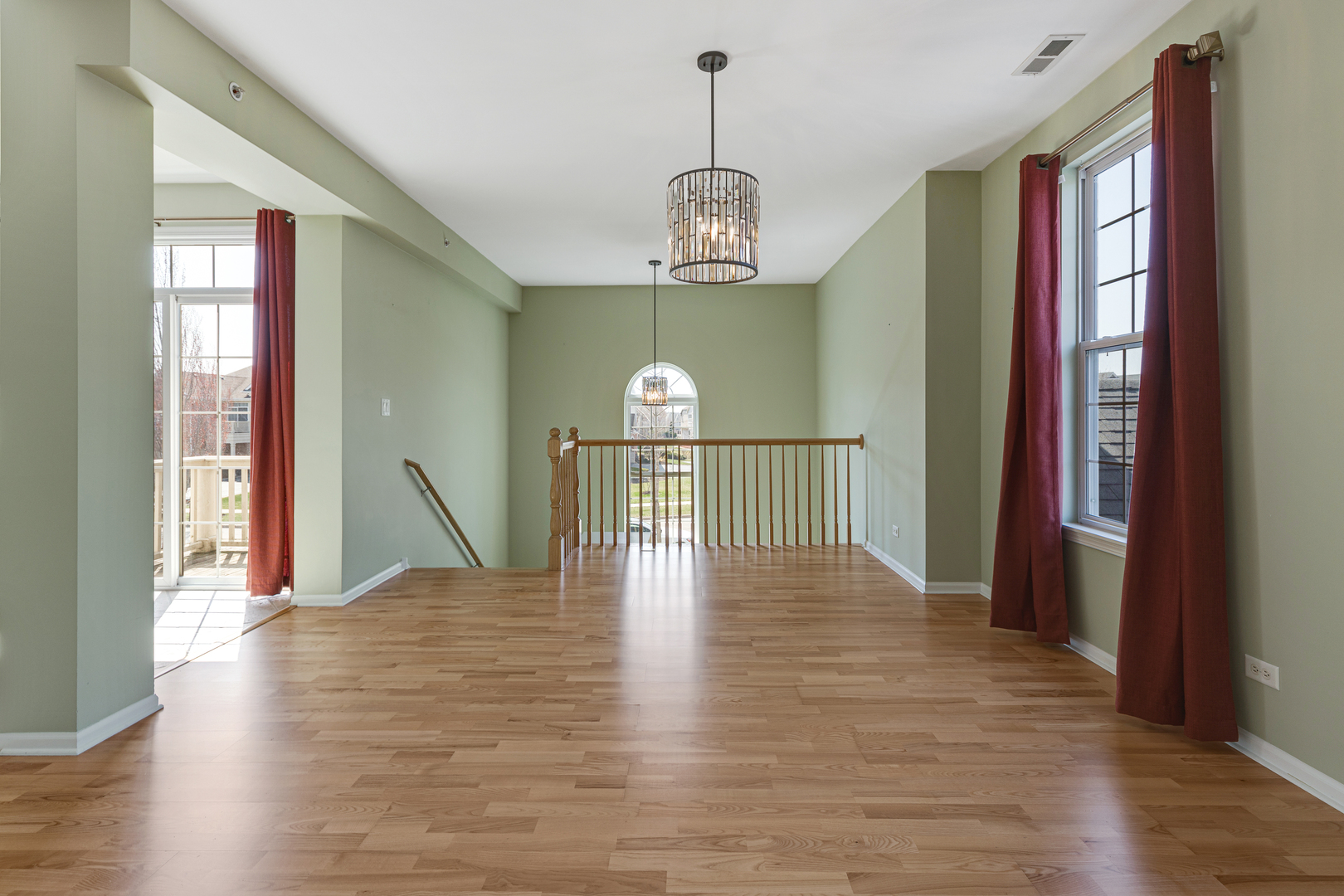 1388 Scarboro Road, Unit 1103 Schaumburg, IL 60193 - Photo 6 of 17 a view of a dining room with furniture window and wooden floor