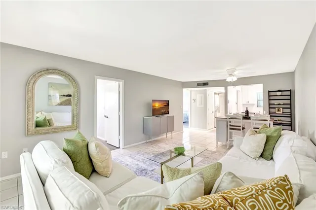 a bedroom with furniture and wooden floor