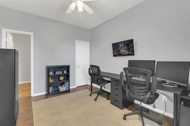 a view of a workspace with furniture