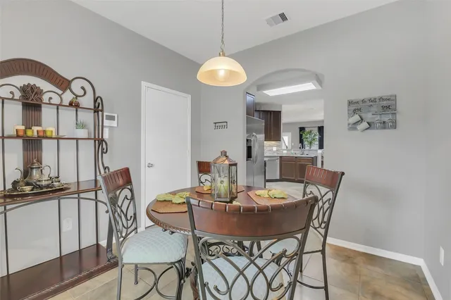 a view of a dining room with furniture