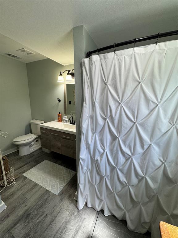 1525 Smith Road Howe, TX 75459 - Photo 11 of 24 a bathroom with a sink toilet and shower