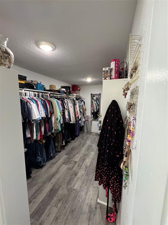 1525 Smith Road Howe, TX 75459 - Photo 12 of 24 a living room with furniture and a fireplace