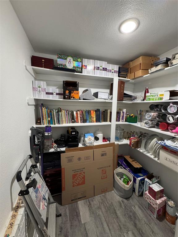1525 Smith Road Howe, TX 75459 - Photo 18 of 24 a room with stainless steel appliances kitchen island granite countertop lots of clutter and stainless steel appliances