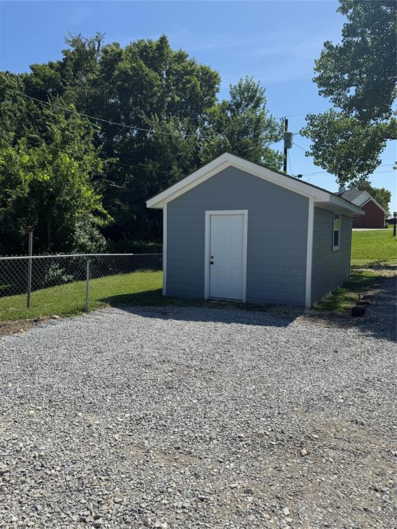 1525 Smith Road Howe, TX 75459 - Photo 20 of 24 a house with trees in the background