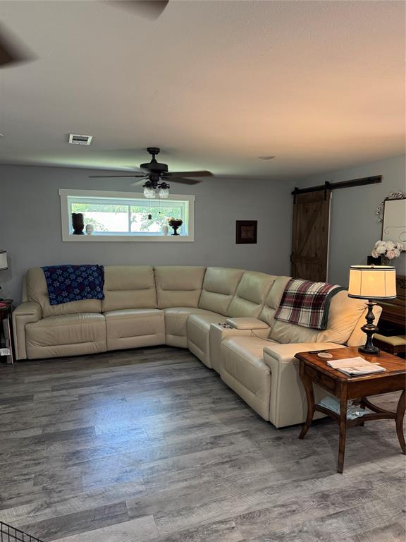 1525 Smith Road Howe, TX 75459 - Photo 3 of 24 a living room with furniture and a lamp